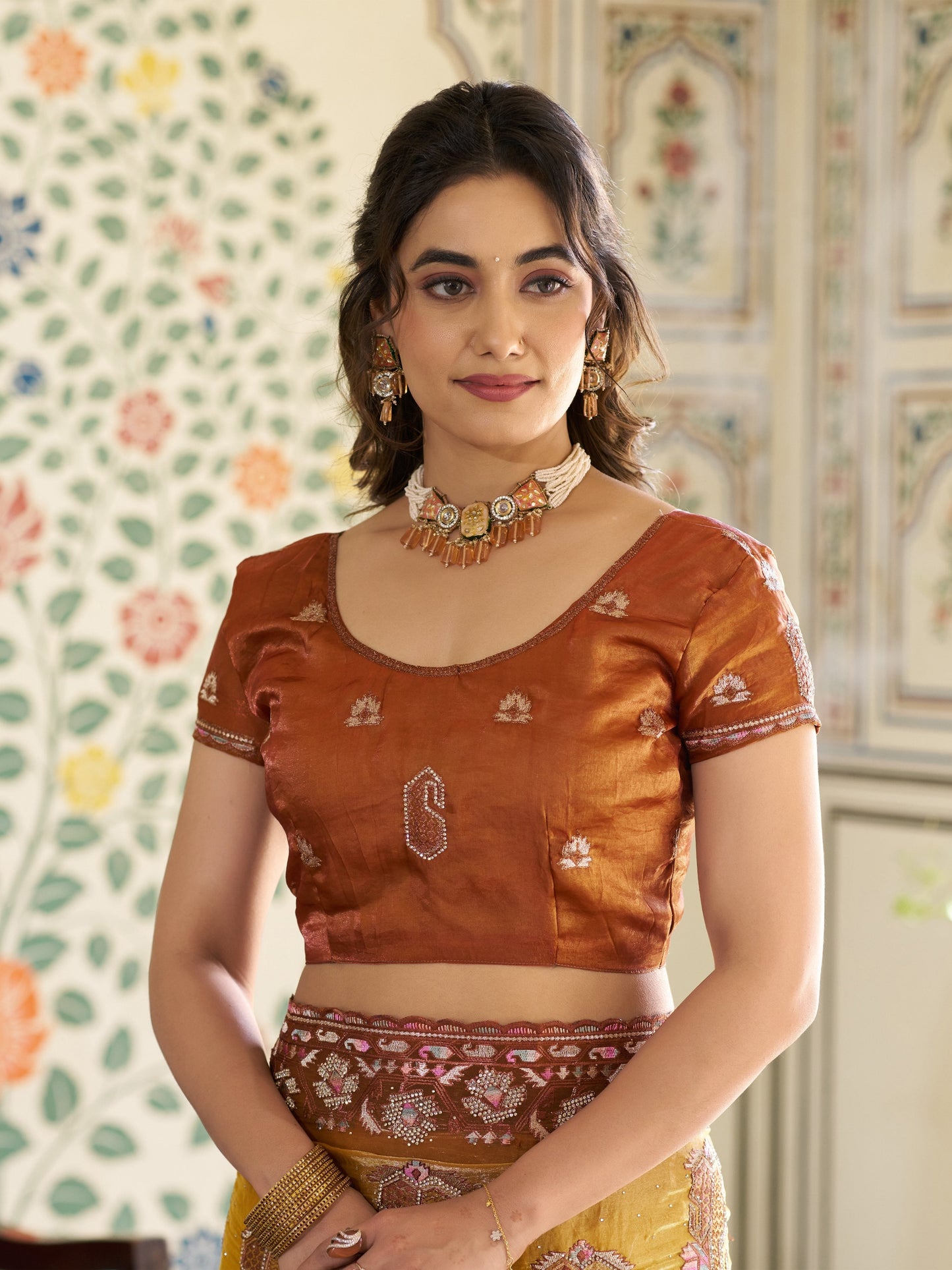 Mustard Yellow Fendy Satin Embroidered Saree with Ethnic Elephant Motifs & Contrast Zari Border | Designer Saree with Tassels & Heavy Embroidered Blouse