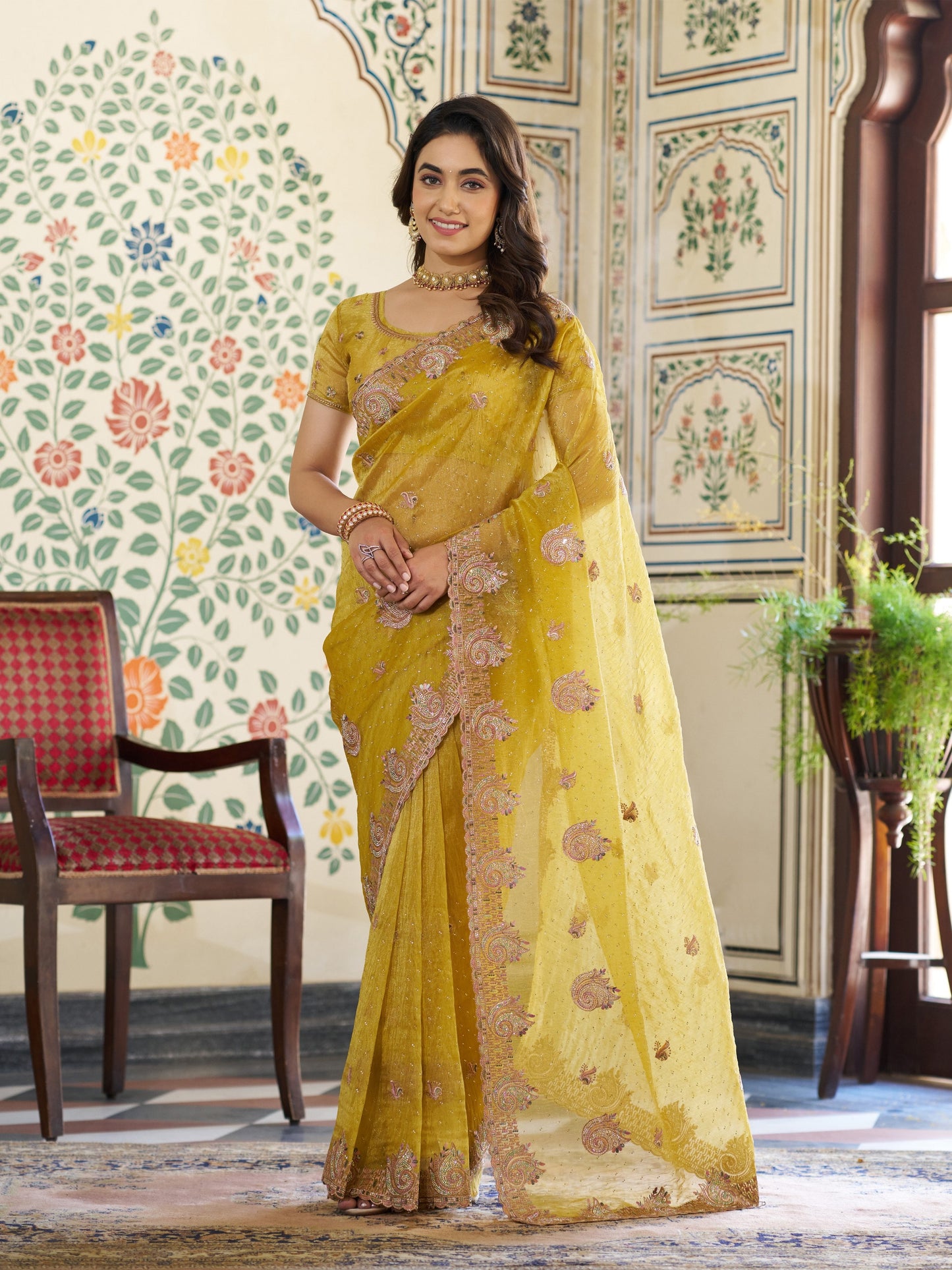 Mustard Yellow Fendy Satin Embroidered Saree with Paisley Motifs & Zari Border | Festive Designer Saree with Tassels & Heavy Embroidered Blouse
