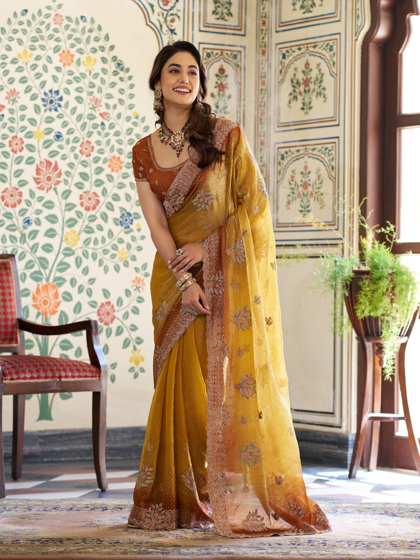 Dual Tone Mustard Yellow & Rust Fendy Satin Embroidered Saree with Floral Motifs & Zari Border | Designer Festive Saree with Tassels & Heavy Embroidered Blouse