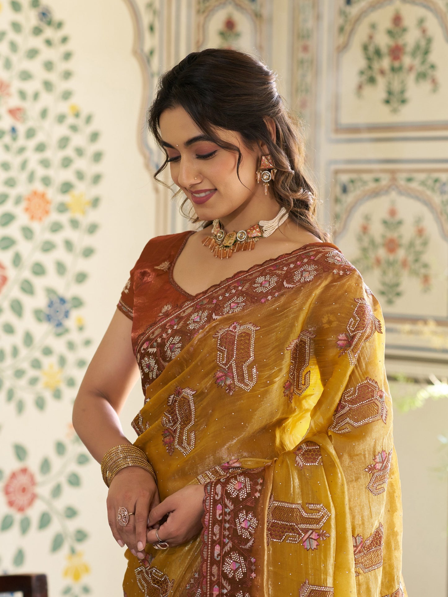 Mustard Yellow Fendy Satin Embroidered Saree with Ethnic Elephant Motifs & Contrast Zari Border | Designer Saree with Tassels & Heavy Embroidered Blouse