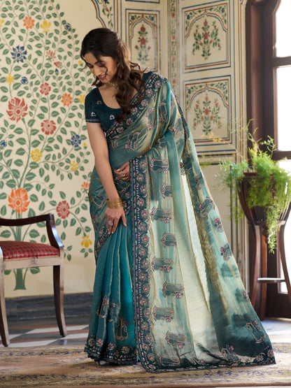 Teal Blue Fendy Satin Embroidered Saree with Ethnic Elephant Motifs & Zari Border | Designer Saree with Tassels & Heavy Embroidered Blouse